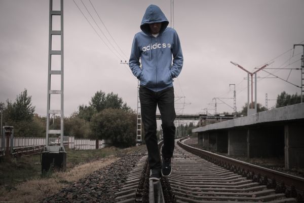 A person standing alone, illustrating loneliness