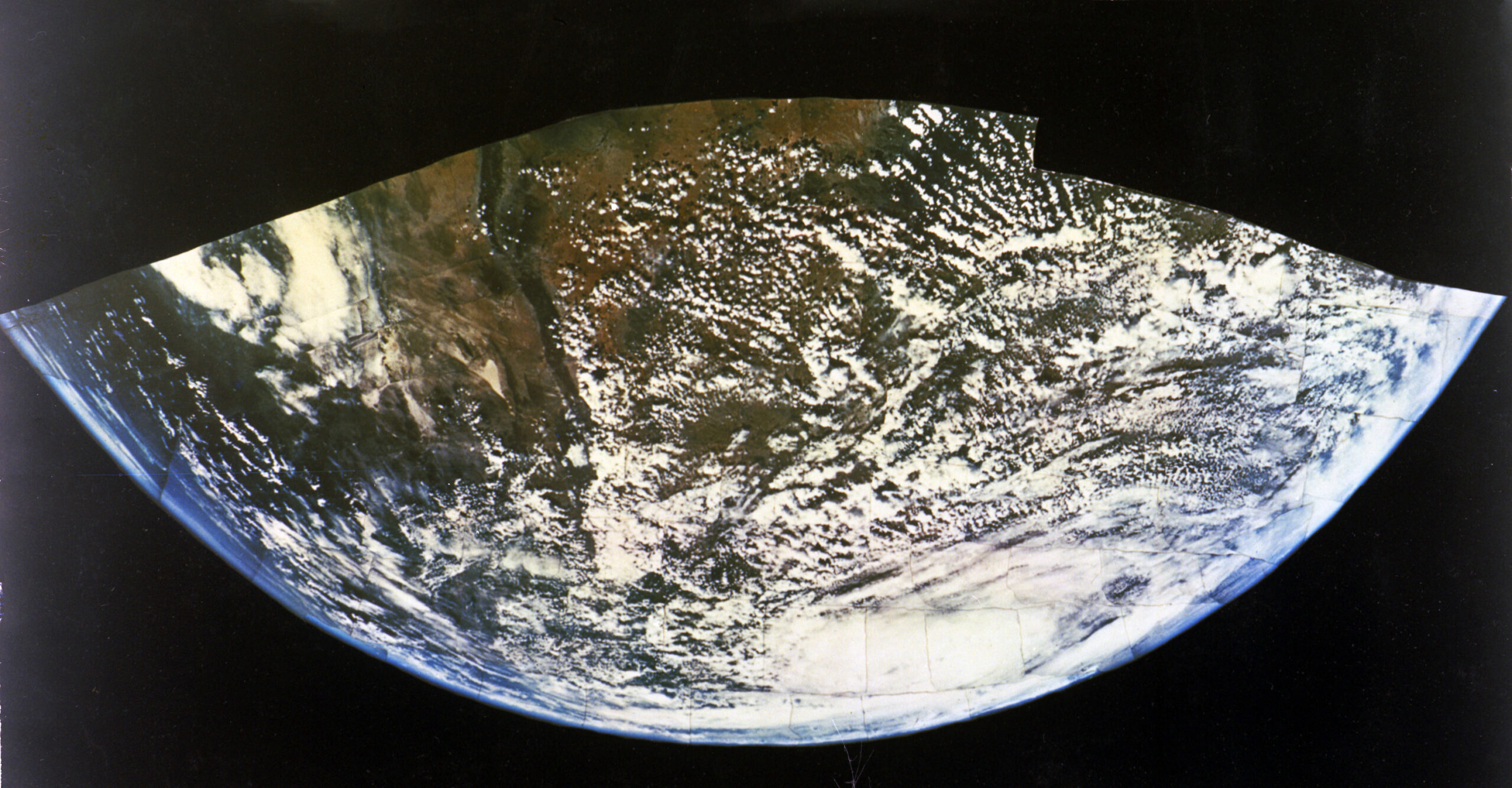Earth seen from space against the darkness of the cosmos