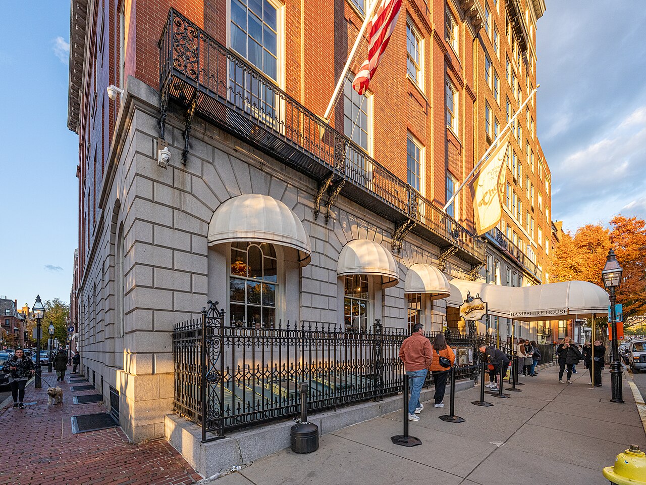 The real Cheers bar in Boston’s Beacon Hill neighborhood, the actual building used for the show’s exterior shots, with visitors lined up outside