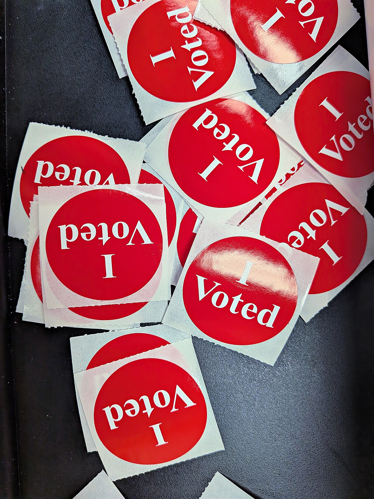 A pile of red I Voted stickers