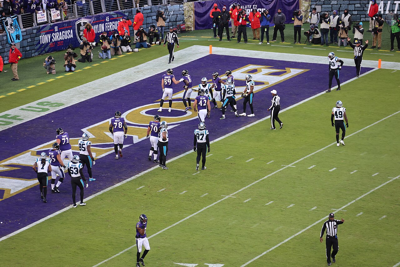 Baltimore Ravens players in their end zone during a home game against Carolina